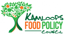 Logo of the Kamloops Food Policy Council featuring a tree with vibrant-colored fruits in light green, dark green, and orange.